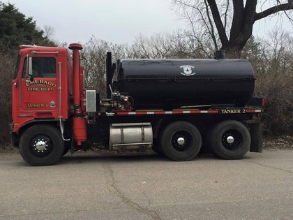 truck with red cabin and black back