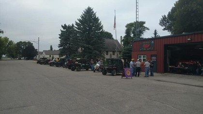 crowd outside of red building