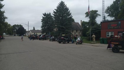 motorcycles lined up on street