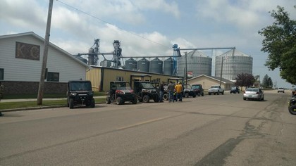 four wheelers lined up on street