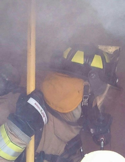 firefighter in a smokey room