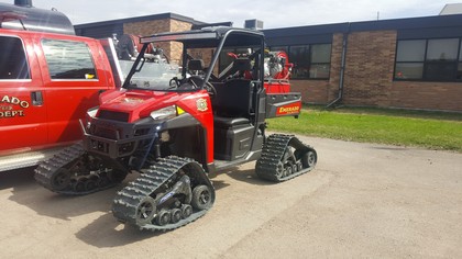 red Polaris Ranger vehicle 